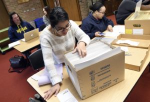 University of Michigan students researching the history of the Trotter House, Tuesday, June 7, 2016, at the Bentley Library.