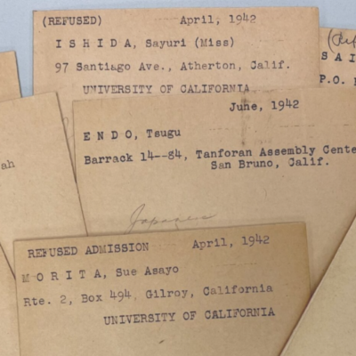 Brown cards with typed text denying Japanese Americans admission to the University of Michigan.