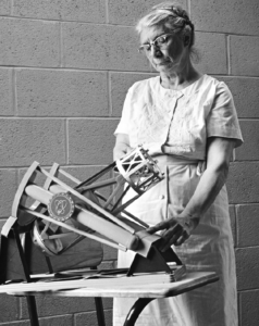 Hazel Marie using an astronomy instrument