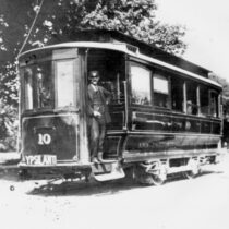 Ypsilanti Interurban Car pictured with the car driver in the front.