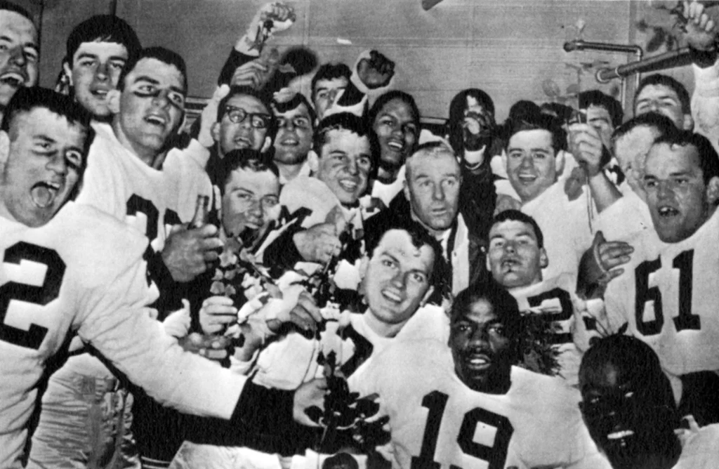 U-M celebrates the Big 10 title after beating OSU, 1964.